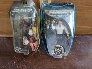 lot 138 image: WWE Boogeyman (2006) & Batista (200...