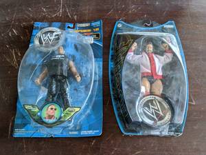 lot 157 image: WWE Eugene (2004) & WWF The Rock (2...