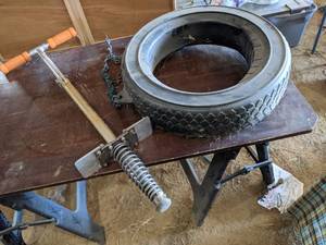 lot 175 image: Pogo Stick, Hard Plastic Tire Swing...