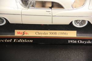 lot 11 image: Maisto Special Edition 118 Die Cast Car 1956 Chrysler 300B