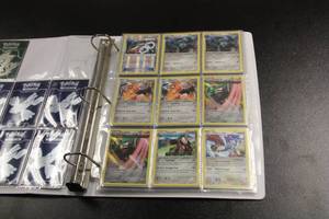 lot 77 image: Pokemon Card Binder Lot  104 Cards
