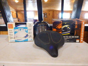 lot 135 image: 3 Helmets and Bicycle Seat
