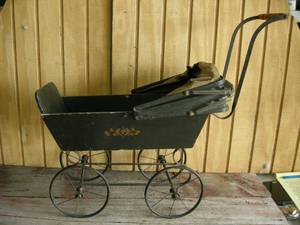 lot 204 image: Antique Doll Buggy
