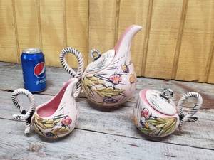 lot 209 image: Vintage Hull Pottery Blossom Flite Teapot, Sugar, Creamer