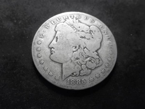 lot 14 image: 1885 O Morgan Silver Dollar
