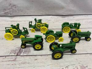 lot 91 image: Lot of 7 John Deere Metal Toys