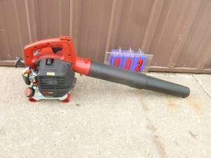 lot 2 image: Craftsman 2 cycle leaf blower. Nearly new. Tested & works. As shown.