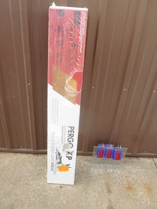 lot 6 image: 1 box of Pergo floor laminate. As shown.