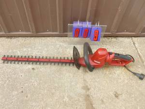 lot 9 image: Craftsman 110 volt hedge trimmer. Lightly used. Tested & works. As shown.