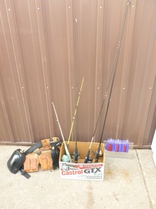 lot 11 image: Fishing poles & tool belt. As shown.