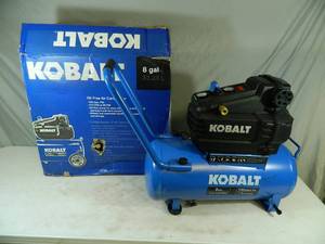 lot 30 image: New Kobalt 8 Gallon Air Compressor (missing wheel)