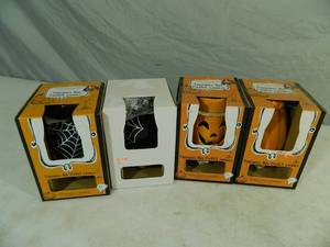 lot 120 image: 4 New Plug In Wax Melt Warmers Halloween Theme