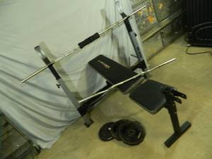 lot 8A image: Weider Weight Bench with 2 Bars and a few Weights