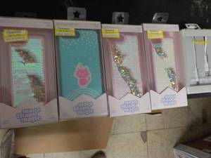 lot 24 image: iPhone Cases and Charging Cable...