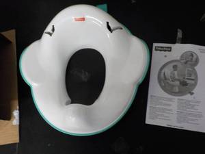 lot 73 image: Fisher Price Potty Ring...
