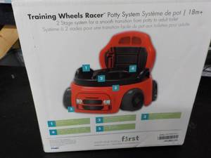 lot 75 image: Training Wheels Racer Potty System...