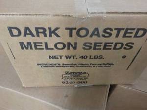lot 269 image: 40 lb. Box Dark Toasted Melon Seeds...