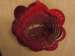 lot 369 image: Red Tractor Wind Spinner...
