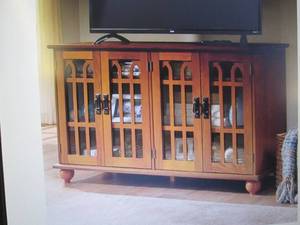 lot 18 image: Arched-Door Mission Style 4-Door TV...