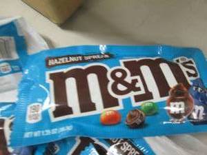 lot 38 image: 9- 1.35 oz Hazelnut Spread M&Ms...