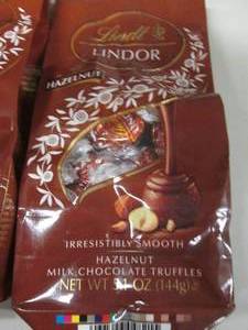 lot 48 image: 4- 5.1 oz Lindoe Hazelnut Chocolate...