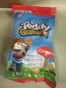 lot 56 image: 12- 3oz bags Teddy Grahams...