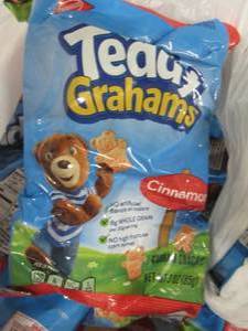 lot 57 image: 12- 3oz bags Teddy Grahams...