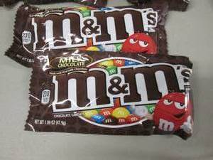lot 110 image: 12- 1.6 oz pks M&Ms...