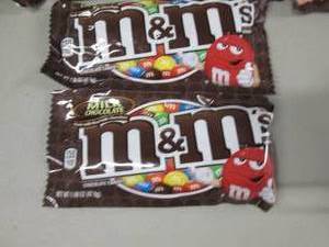 lot 113 image: 12- 1.6 oz pks M&Ms...