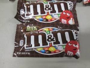 lot 114 image: 12- 1.6 oz pks M&Ms...