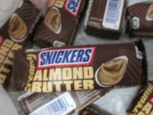 lot 130 image: 12- 1.4 oz Snickers Almond Butter B...