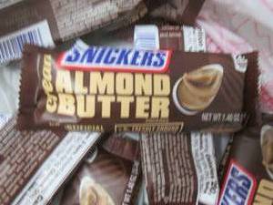 lot 131 image: 12- 1.4 oz Snickers Almond Butter B...