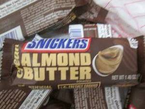 lot 132 image: 12- 1.4 oz Snickers Almond Butter B...