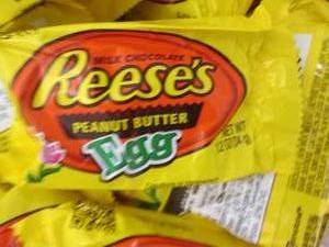 lot 165 image: 24 pks Reeses Eggs...