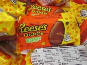 lot 169 image: 24 pks Reeses Pieces Eggs...