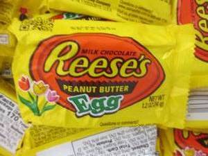 lot 203 image: 24 pks Reeses Pieces Eggs...