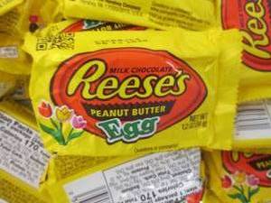 lot 206 image: 24 pks Reeses Pieces Eggs...