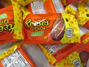 lot 207 image: 24 pks Reeses Pieces Eggs...