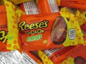 lot 208 image: 24 pks Reeses Pieces Eggs...