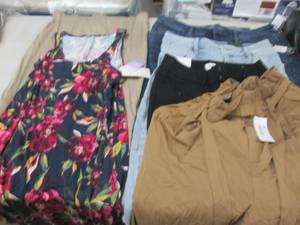 lot 231 image: 2 Sleepwear Items, 2 Jeans, 2 Pants...