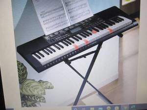 lot 316 image: Lighted Keyboard Kit by Casio open ...