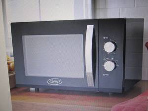 lot 342 image: Ginnys 1.2 Cu. Ft. Microwave open ...