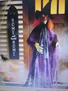 lot 348 image: Standing Purple Witch  open box Ret...