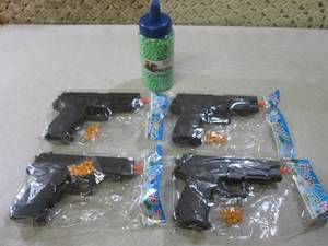 4 Airsoft Pistols with Bottle of 20...