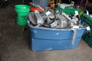 lot 35 image: Lot of (1 Tote) MiTek USP HUS179 ESR-2865FL17232LABC Metal Brackets Triple Zinc G-185, Simpson Strong-Tie LUS210Z ESR-2523