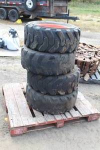 lot 51 image: Lot of (4) Solideal Xtra-Wall Foam Filled Skid Steer Tires 10-16.5