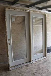 lot 55 image: Single Glass Pane Patio Door with Frame