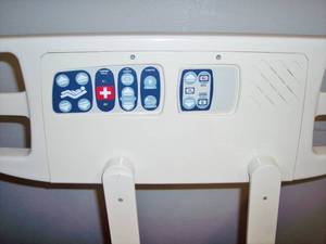 lot 10 image: MSRP $15,000 STRYKER SECURE II MEDSURG HOSPITAL BED 500LB CAPACITY wCHAIR POSITION, ZONE EXIT ALARM & DIGITAL SCALE ALSO INCLUDES FREE MATTRESS & PLUGS INTO REGULAR HOME LIGHT SOCKET - PLEASE SEE PDF