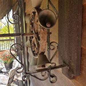 lot 1126 image: Whimsical Spinning Dinner Bell