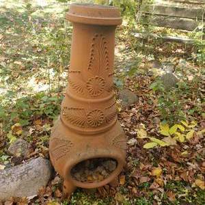 lot 512 image: Charming Clay Footed Chiminea